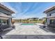 Gorgeous pool area with comfortable porch swings, perfect for relaxing and enjoying the beautiful surroundings at 29043 Picana Ln, Wesley Chapel, FL 33543