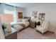 Cozy bedroom with a twin bed, soft lighting, and tasteful decor creating a peaceful and inviting atmosphere at 28166 S Twin Lakes Dr, Punta Gorda, FL 33955