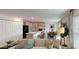 Bright living room with contemporary décor flows into the kitchen and dining area, creating an inviting living space at 28166 S Twin Lakes Dr, Punta Gorda, FL 33955