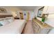 Serene main bedroom featuring a comfortable bed, ample closet space, and elegant furnishings for a restful retreat at 28166 S Twin Lakes Dr, Punta Gorda, FL 33955