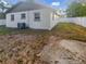 Spacious backyard with an air conditioning unit and a privacy fence at 1736 Taylor Lake Pl, Largo, FL 33778