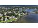 Stunning aerial view of the Lake Padgett community, showcasing the lakefront homes at 3565 E Lake Dr, Land O Lakes, FL 34639