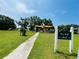 East Lake Park features a playground with shady awnings and green space, a great Gathering space at 3565 E Lake Dr, Land O Lakes, FL 34639