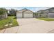 Charming single Gathering home with a two car garage and pristine landscaping at 13828 Richland Gulf Cir, Parrish, FL 34219