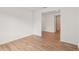 Bright room with wood-style flooring and natural light at 13828 Richland Gulf Cir, Parrish, FL 34219