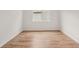 Inviting room with wood-style flooring and natural light at 13828 Richland Gulf Cir, Parrish, FL 34219