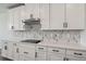 Stylish kitchen featuring sleek countertops and modern stainless steel appliances at 1780 Draughton Dr, Zephyrhills, FL 33541
