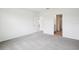 Neutral bedroom with closet and ensuite bathroom at 1828 Brekey Way, Zephyrhills, FL 33541