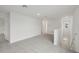Upstairs living area with plush carpeting, neutral walls, and a staircase at 1855 Brekey Way, Zephyrhills, FL 33541
