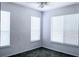 Cozy bedroom with a ceiling fan and windows providing natural light at 5000 Culbreath Key Way # 9-101, Tampa, FL 33611