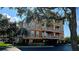 Multi-story condo building shows balconies and under building parking at 5000 Culbreath Key Way # 9-101, Tampa, FL 33611
