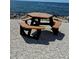 Enjoy waterfront picnics on this beautiful property; table has an umbrella hole and seating for six at 5000 Culbreath Key Way # 9-101, Tampa, FL 33611