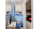 Small bathroom with white tiles and a vanity at 5415 Riddle Rd, Holiday, FL 34690