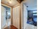 A hallway showing a bedroom and an office space at 5415 Riddle Rd, Holiday, FL 34690