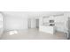 Spacious living room and kitchen area perfect for entertaining and modern living at 7728 Gilchrist Springs Dr, Parrish, FL 34219