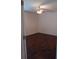 This bedroom features dark wood floors and a ceiling fan at 10415 Lucaya Dr, Tampa, FL 33647