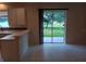 Sunny dining area with backyard access through sliding glass doors at 10415 Lucaya Dr, Tampa, FL 33647