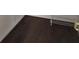 Close up of hardwood floor with wood baseboard at 10415 Lucaya Dr, Tampa, FL 33647