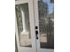 Elegant front doors featuring decorative glass panels and stylish hardware at 10415 Lucaya Dr, Tampa, FL 33647