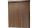Vertical window blinds with subtle decorative design, covering the window at 10415 Lucaya Dr, Tampa, FL 33647