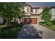 Charming two-story home featuring a paved driveway and a well-maintained front yard at 13083 Burns Dr, Odessa, FL 33556