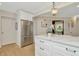 Spacious kitchen with center island, stainless steel appliances, and white cabinetry at 709 S Himes Ave, Tampa, FL 33609