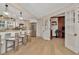 Spacious kitchen with center island with bar seating, stainless steel appliances, and bright lighting at 709 S Himes Ave, Tampa, FL 33609