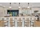 Beautiful kitchen with large island, pendant lights, stainless steel appliances and bar stool seating at 709 S Himes Ave, Tampa, FL 33609