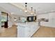 Spacious kitchen with center island, stainless steel appliances, and white cabinetry at 709 S Himes Ave, Tampa, FL 33609