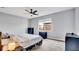 Serene bedroom with a ceiling fan and neutral tones, offering a peaceful retreat at 5016 W Lancaster St # 00, Tampa, FL 33616