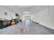 Spacious garage featuring a blue floor and a toolbox at 5016 W Lancaster St # 00, Tampa, FL 33616