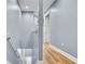 Hallway with hard floors and staircase at 5016 W Lancaster St # 00, Tampa, FL 33616