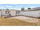 Paver patio and white fence create this private backyard space at 10227 Parsons St, Tampa, FL 33615