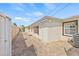 A paver pathway leads along the side of this well-maintained single story home at 10227 Parsons St, Tampa, FL 33615