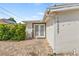 Inviting entrance featuring brick pavers, updated doors, and well-maintained greenery at 10227 Parsons St, Tampa, FL 33615