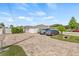 A well maintained single story home with brick pavers, mature landscaping and solar panels at 10227 Parsons St, Tampa, FL 33615