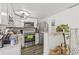 Modern kitchen with stainless steel appliances, white cabinetry, and a stylish backsplash at 10227 Parsons St, Tampa, FL 33615