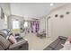 A living room features stylish furnishings and decor with tile floors at 10227 Parsons St, Tampa, FL 33615