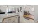 Bright open-concept living space with kitchen island and dining area at 10227 Parsons St, Tampa, FL 33615