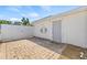 Private patio area with brick pavers, ideal for outdoor entertaining and leisure at 10227 Parsons St, Tampa, FL 33615