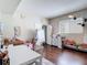 Bonus room with hardwood floors, a white table and chairs, and plenty of storage and toys at 18109 Kara Ct, Tampa, FL 33647