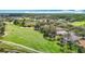 View of a verdant golf course and nearby pond at 18109 Kara Ct, Tampa, FL 33647