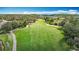 Lush community golf course and cart path surrounded by trees at 18109 Kara Ct, Tampa, FL 33647