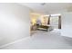 Spacious main bedroom features a large window, carpet, ceiling fan and neutral decor at 18109 Kara Ct, Tampa, FL 33647