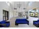 Community lounge area with comfortable seating and outdoor kitchen at 18875 Noble Caspian Dr, Lutz, FL 33558