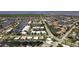 Aerial view of waterfront community with canals, homes, and lush landscape, showcasing location at 260 Coronado Dr, Punta Gorda, FL 33950