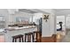 Kitchen with breakfast bar seating, white cabinets, and an easy flow to other rooms in the home at 260 Coronado Dr, Punta Gorda, FL 33950