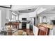 Well-equipped kitchen with stainless steel appliances, white cabinets, and granite countertops at 260 Coronado Dr, Punta Gorda, FL 33950