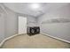 Bright laundry area with modern washer and dryer units, overhead storage, and convenient access to the garage at 4239 Brentwood Park Cir, Tampa, FL 33624