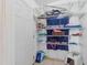Organized storage area with shelving, offering ample space for household items and supplies at 5392 Maze Dr, Punta Gorda, FL 33982